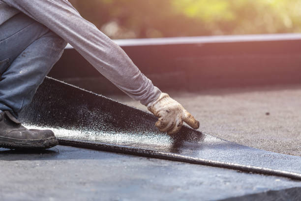 Professional Basement Waterproofing technician working in Louisville, TN